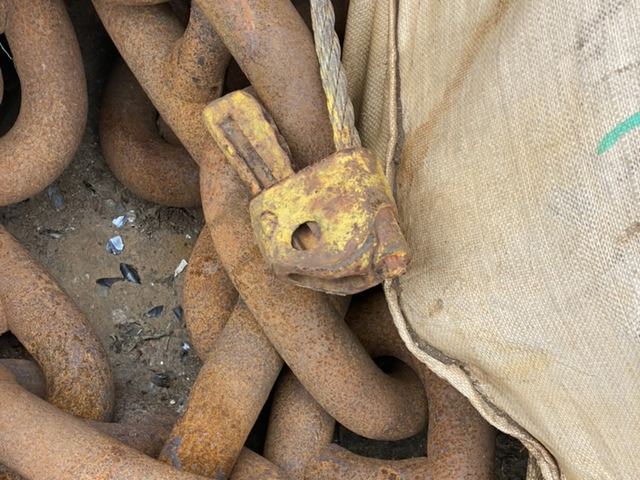 Heavy chain with a yellow connecting fitting in our depot