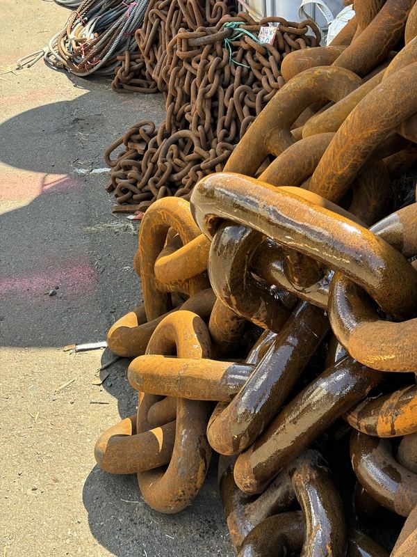 Close-up of heavy stud link chain in our depot